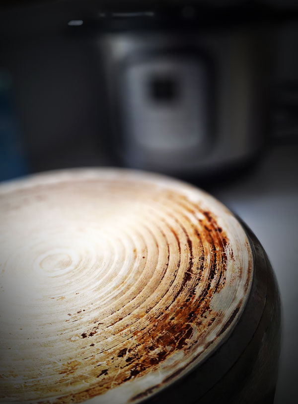 Instant Pot pot scorched on bottom.