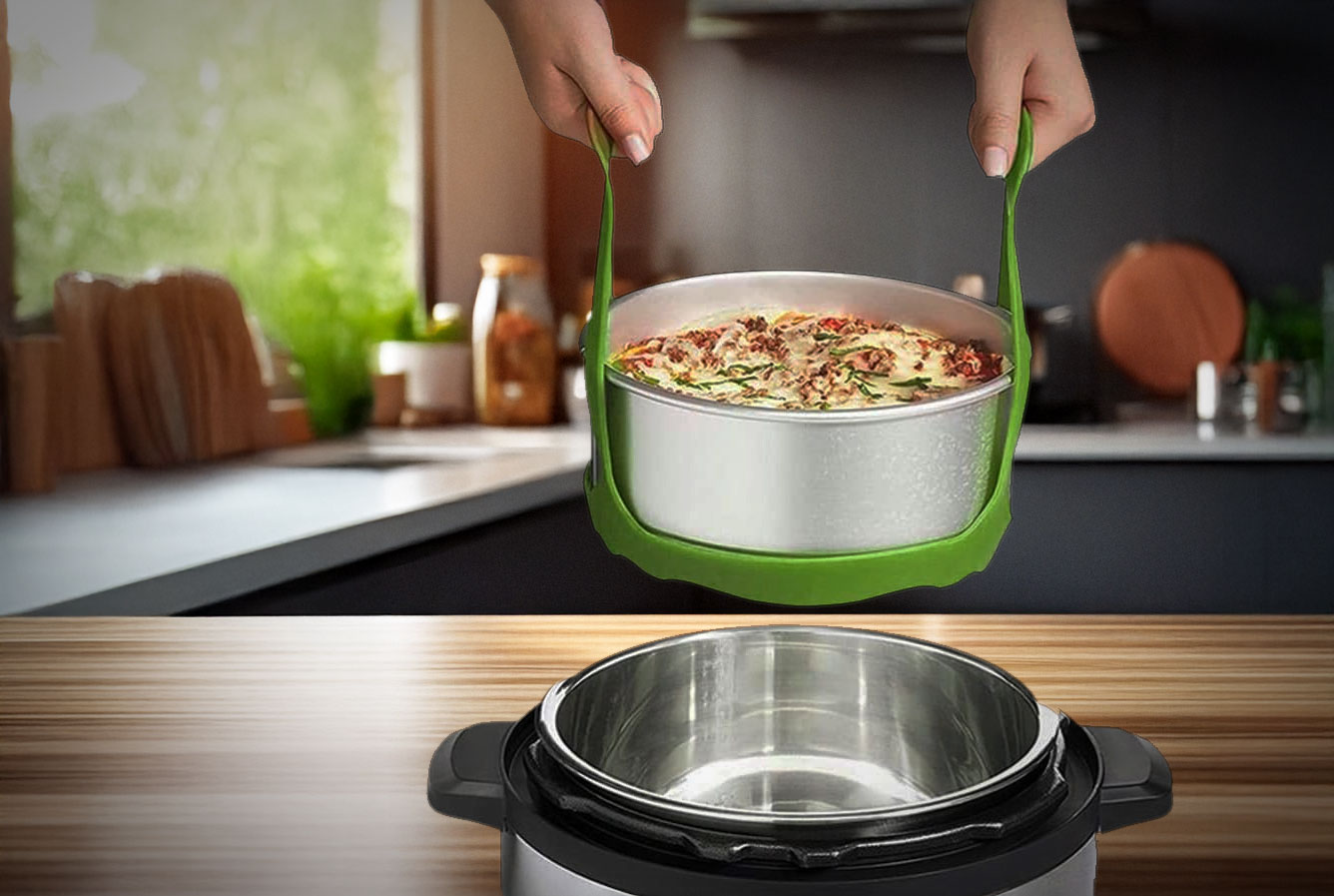 Silicon sling lowering pot into instant pot.